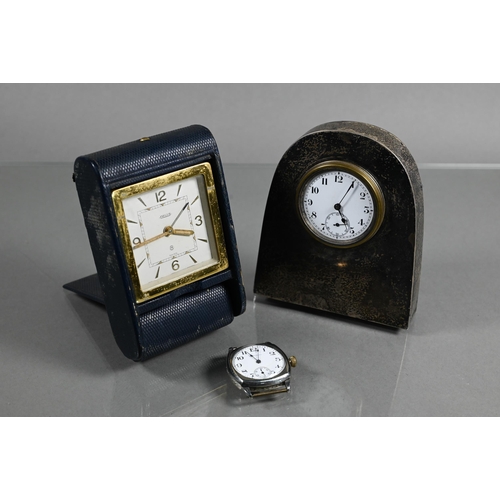 429 - A gilt metal Jaeger travel alarm clock to/with a vintage Waltham stainless steel wrist watch and a s... 