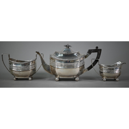 56 - A late Victorian heavy quality silver three-piece tea service in the Regency manner, with gadrooned ... 