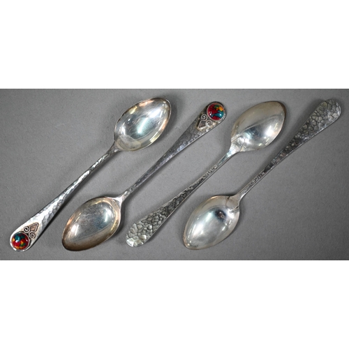 68 - Langstone Silverworks (Bernard Instone): a set of six planished silver teaspoons with enamel boss fi... 