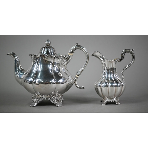 70 - A Victorian silver melon-shaped teapot with cast melon finial and scroll handle with ivory insulator... 