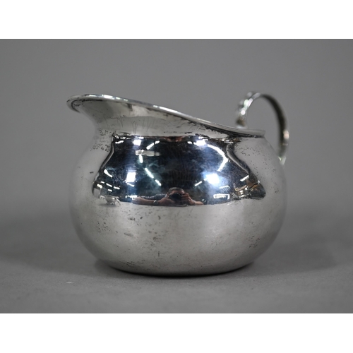 76 - A Regency Irish silver open salt, the egg and dart moulded rim with chased foliate and shell decorat... 