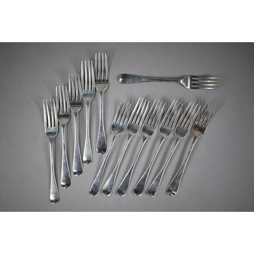 79 - A matched set of twelve Georgian silver dessert forks, various makers and dates, 1810-1824, 14.1oz