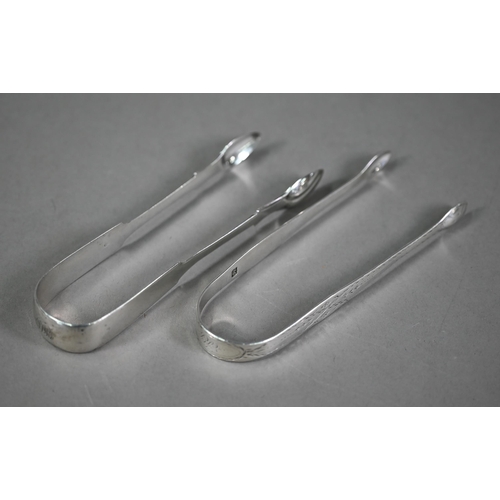 85 - Hester Bateman: a pair of bright-cut sugar tongs, assay and maker's marks only, to/w a pair of Georg... 