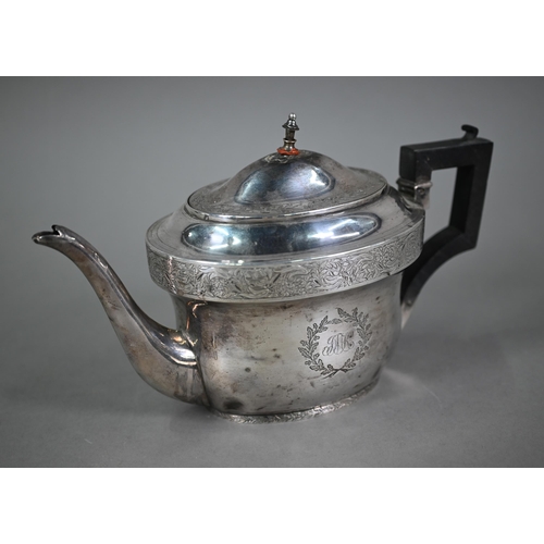 90 - A Regency silver teapot of oval form with foliate engraved decoration and composite handle, Abstinan... 