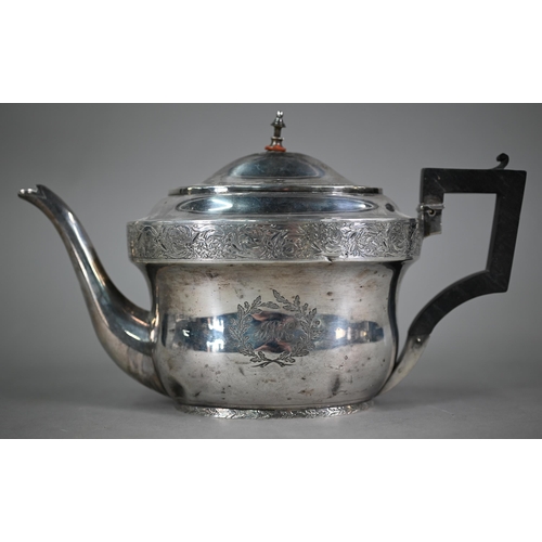 90 - A Regency silver teapot of oval form with foliate engraved decoration and composite handle, Abstinan... 