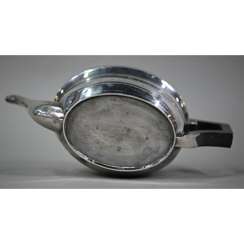 90 - A Regency silver teapot of oval form with foliate engraved decoration and composite handle, Abstinan... 