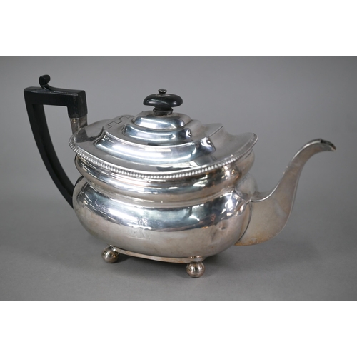 91 - A George III silver teapot of oblong form, with ebonised finial and handle, egg and dart moulded rim... 