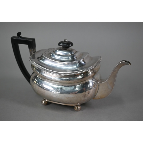 91 - A George III silver teapot of oblong form, with ebonised finial and handle, egg and dart moulded rim... 