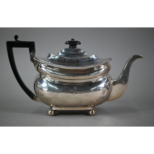 91 - A George III silver teapot of oblong form, with ebonised finial and handle, egg and dart moulded rim... 