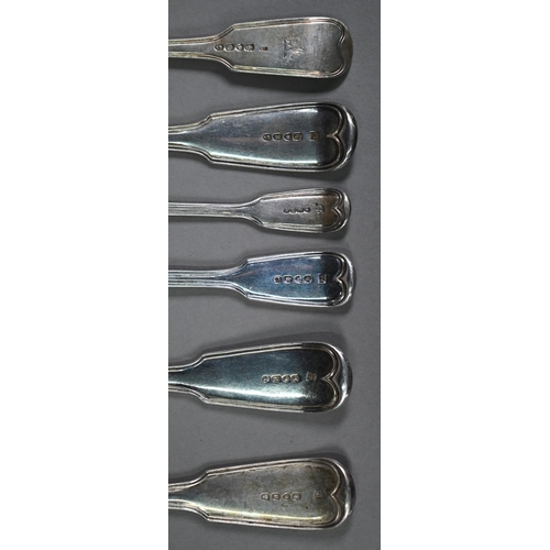 92 - A matched set of Victorian silver fiddle and thread serving flatware, including soup spoon, basting ... 