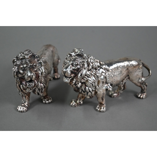 99 - A pair of silver-clad lions, Sheffield 2011, 12 x 19cm