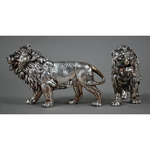 99 - A pair of silver-clad lions, Sheffield 2011, 12 x 19cm