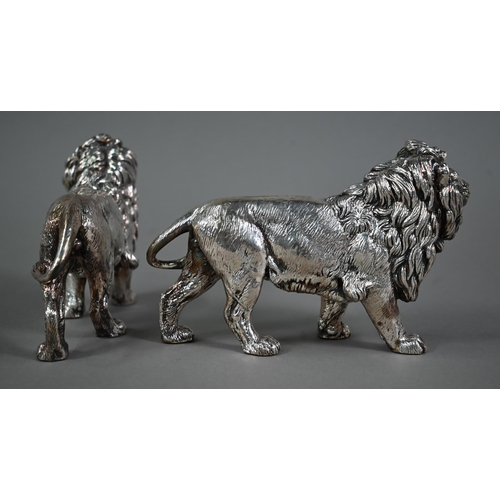 99 - A pair of silver-clad lions, Sheffield 2011, 12 x 19cm