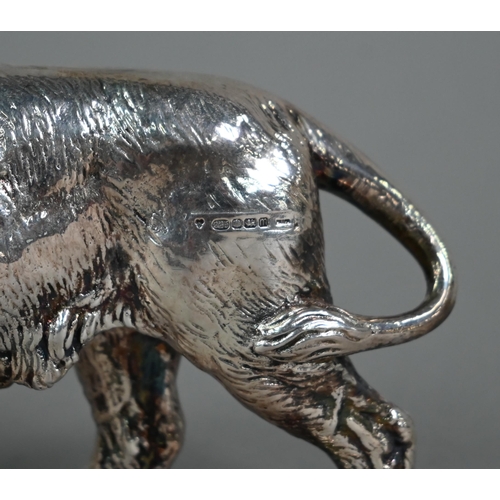 99 - A pair of silver-clad lions, Sheffield 2011, 12 x 19cm