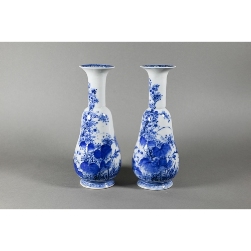 458 - A pair of late 19th or early 20th century Japanese blue and white (sometsuke) gourd shaped vases, Me... 
