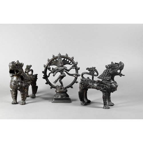 464 - A pair of 20th century Tibetan bronze celestial Snow Lions, 14 cm high to/w a small Indian bronze fi... 