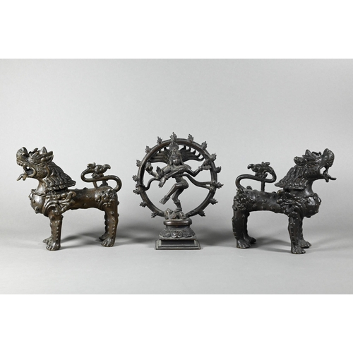 464 - A pair of 20th century Tibetan bronze celestial Snow Lions, 14 cm high to/w a small Indian bronze fi... 