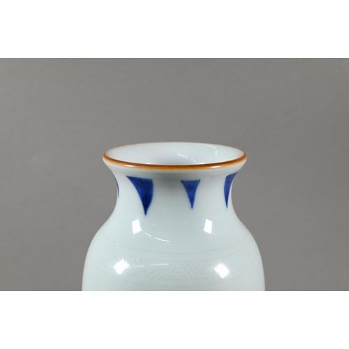 469 - A Chinese Transitional style blue and white sleeve vase, painted in rich tones of underglaze blue wi... 
