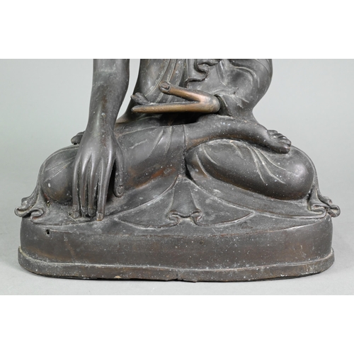 470 - A large 19th century Burmese Mandalay style bronze Shakyamuni Buddha, seated in the lotus position o... 