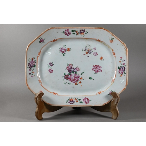 472 - A graduated set of three 18th century Chinese famille rose octagonal platters with lobed corners and... 