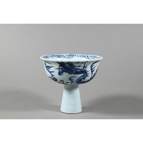 473 - A Chinese blue and white 'Dragon' stem cup in the late Yuan/early Ming dynasty style, painted in und... 