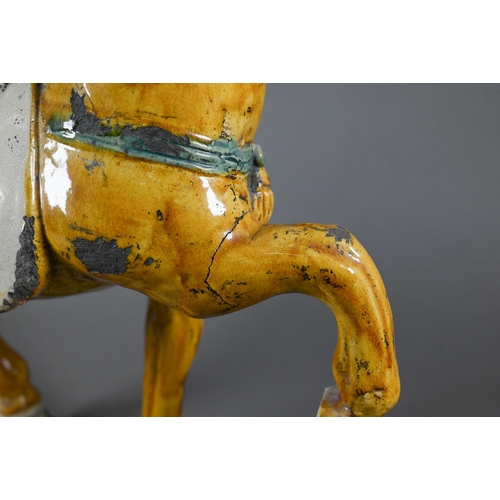 478 - A Chinese Tang style Sancai glazed horse, 20th century, 31 cm high