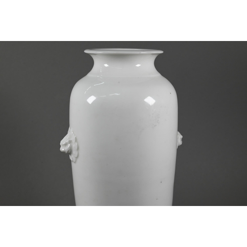 480 - A 17th century Chinese Dehua or blanc-de-chine sleeve vase of tapering cylindrical form with short e... 
