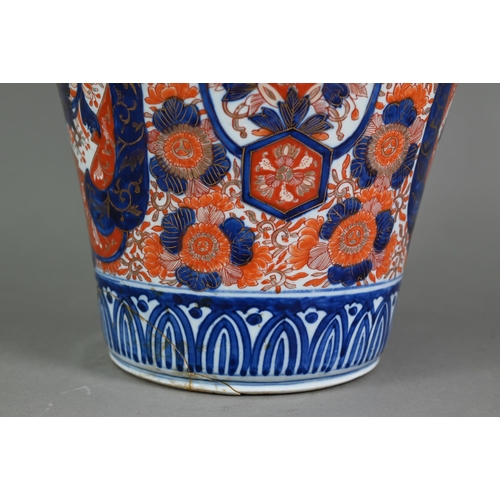 494 - A large 19th century Japanese baluster vase with short flared neck, painted with fruits in vines and... 