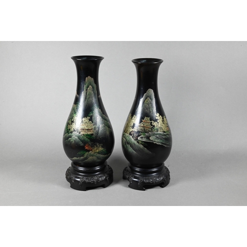 499 - A pair of late 20th century Chinese Fuzhou bodiless lacquer vases with integral stands, painted and ... 