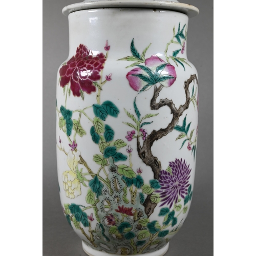 504 - A 19th century Chinese famille rose jar and cover, painted in polychrome enamels with two butterflie... 