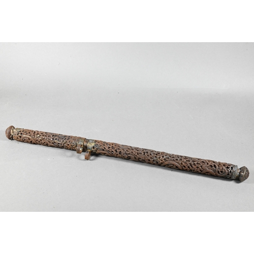 510 - An antique Tibetan iron tubular pen case and cover (probably Derge, Eastern Tibet) profusely chased ... 