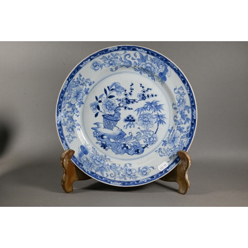 514 - An 18th century Chinese blue and white octagonal plate painted with pagoda landscape design and flor... 