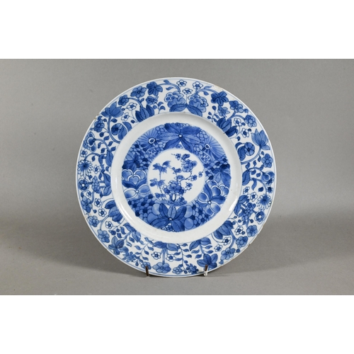 514 - An 18th century Chinese blue and white octagonal plate painted with pagoda landscape design and flor... 