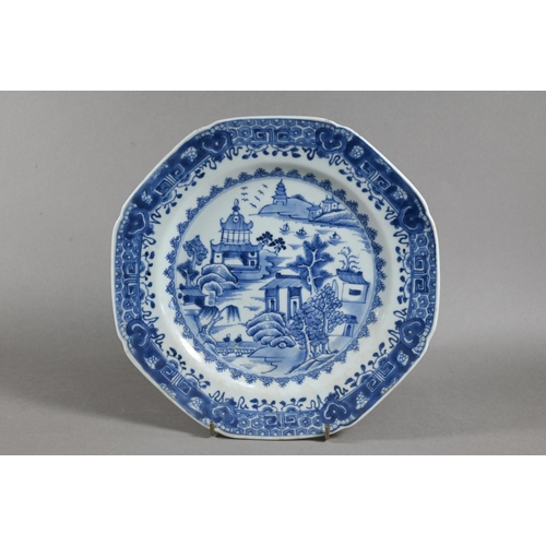 514 - An 18th century Chinese blue and white octagonal plate painted with pagoda landscape design and flor... 