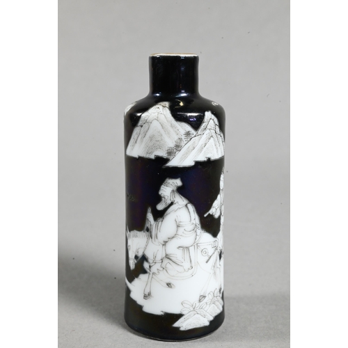 515 - A 19th century Chinese black ground en-grisaille porcelain snuff bottle of high shouldered cylindric... 