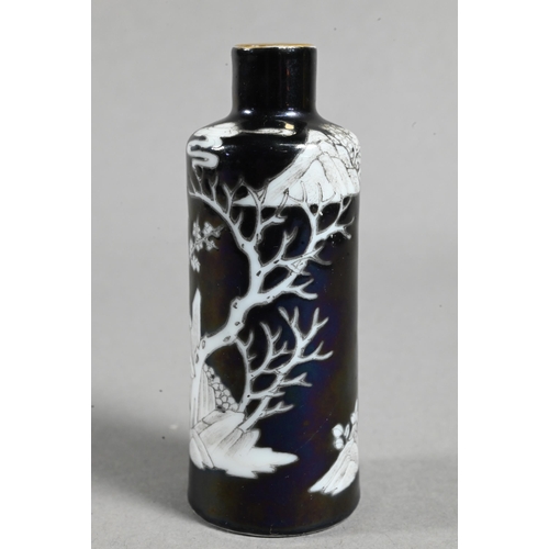 515 - A 19th century Chinese black ground en-grisaille porcelain snuff bottle of high shouldered cylindric... 