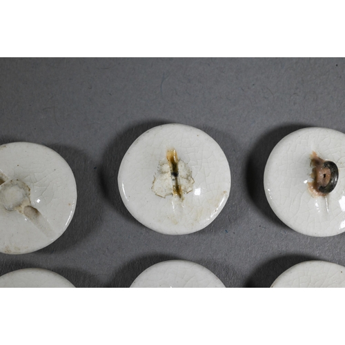 517 - Six early 20th century Japanese ceramic buttons gilded and painted in polychrome enamels with Geisha... 