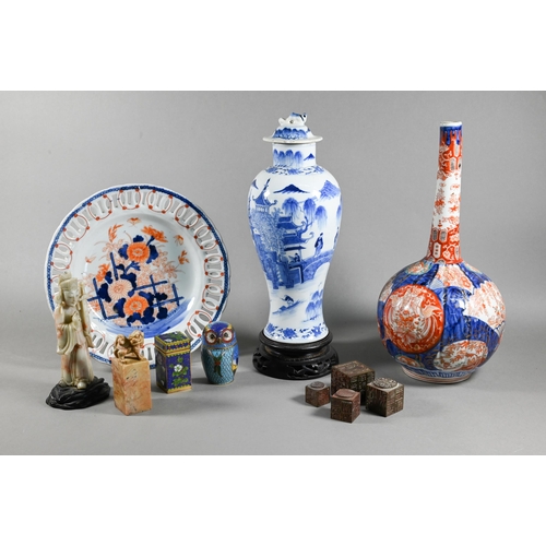 520 - A small collection of Asian china and collectables including a 19th century Chinese blue and white v... 