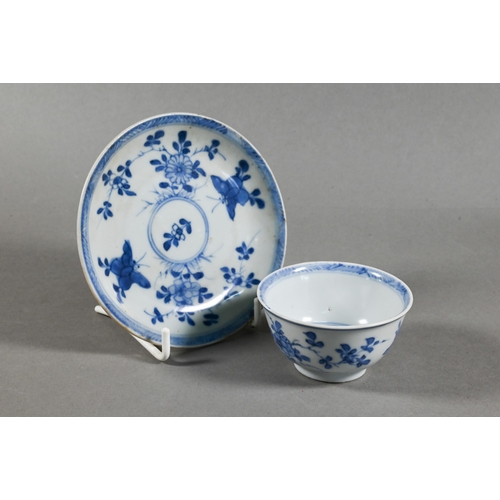 524 - An 18th century Chinese Ca Mau shipwreck porcelain tea bowl and saucer, painted in underglaze blue w... 