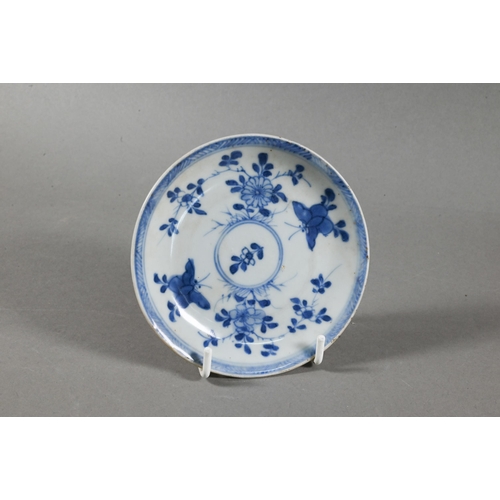 524 - An 18th century Chinese Ca Mau shipwreck porcelain tea bowl and saucer, painted in underglaze blue w... 