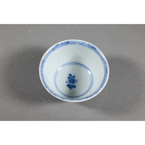 524 - An 18th century Chinese Ca Mau shipwreck porcelain tea bowl and saucer, painted in underglaze blue w... 