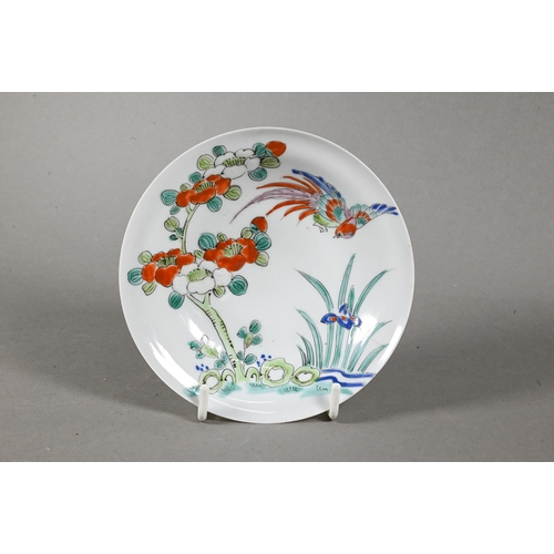 526 - A 19th century Chinese famille rose scalloped dish painted in bright polychrome enamels with five Bu... 