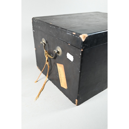 532 - An early 19th century Chinese black lacquer rectangular tea chest with brass handles, the hinged cov... 