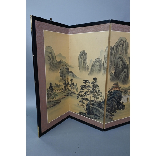 534 - A 20th century Japanese folding screen, Byobu, the four-panels painted with ink and colour depicting... 