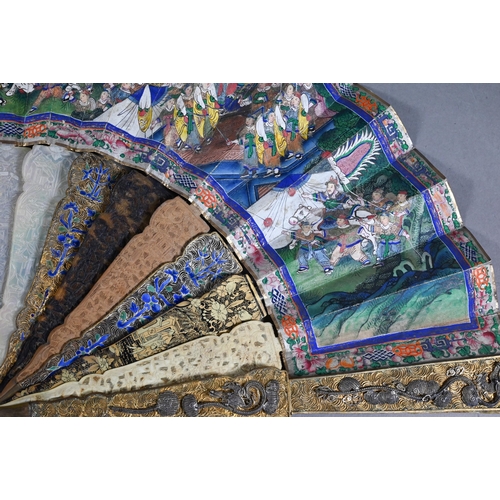 535 - A 19th century Cantonese fan, the paper leaf painted with harbour scenes - probably Hong Kong - with... 