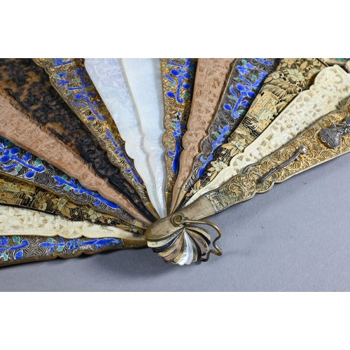 535 - A 19th century Cantonese fan, the paper leaf painted with harbour scenes - probably Hong Kong - with... 