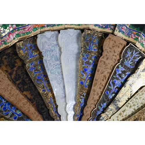 535 - A 19th century Cantonese fan, the paper leaf painted with harbour scenes - probably Hong Kong - with... 