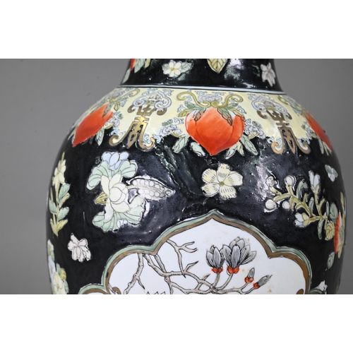 540 - A late 19th or early 20th century Chinese famille noire style baluster vase (drilled and mounted as ... 