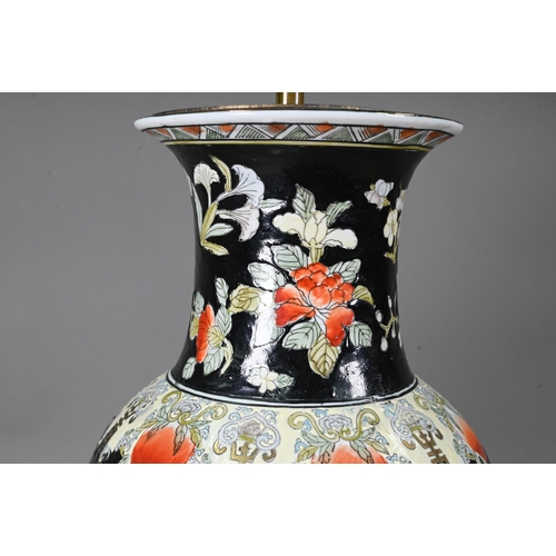 540 - A late 19th or early 20th century Chinese famille noire style baluster vase (drilled and mounted as ... 