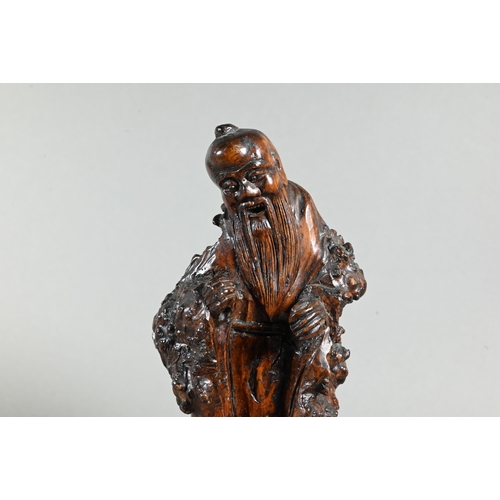 545 - A 19th century Chinese carved burr root wood figure, possibly Shou-Lao (Daoist God of Longevity) mou... 